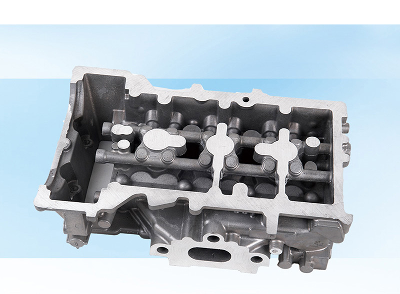 Passenger car engine cylinder head