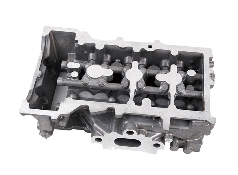 Passenger car engine cylinder head